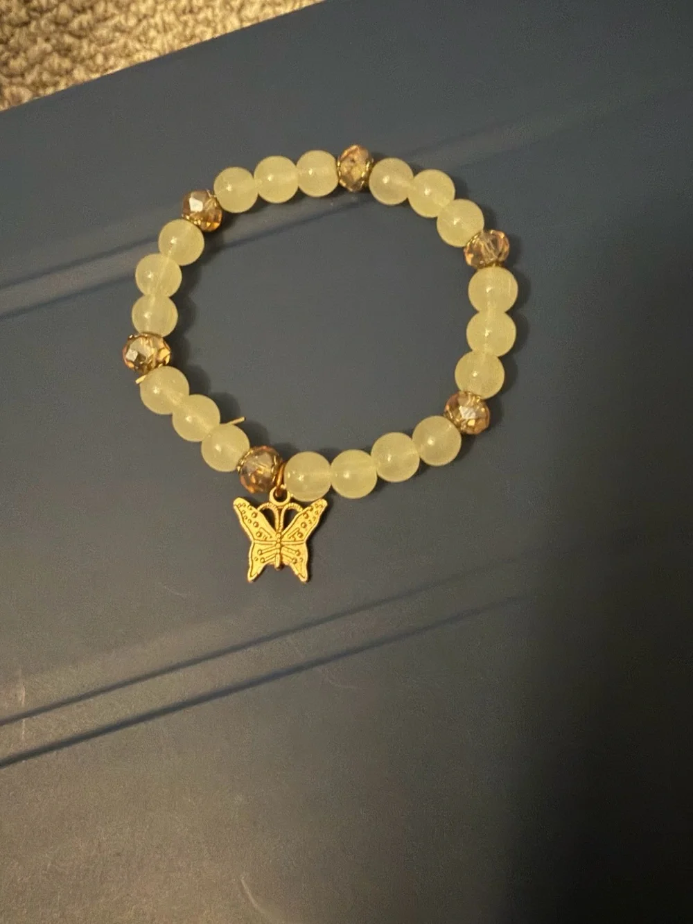 Gold Butterfly Charm Stretch Bracelet with round Beads